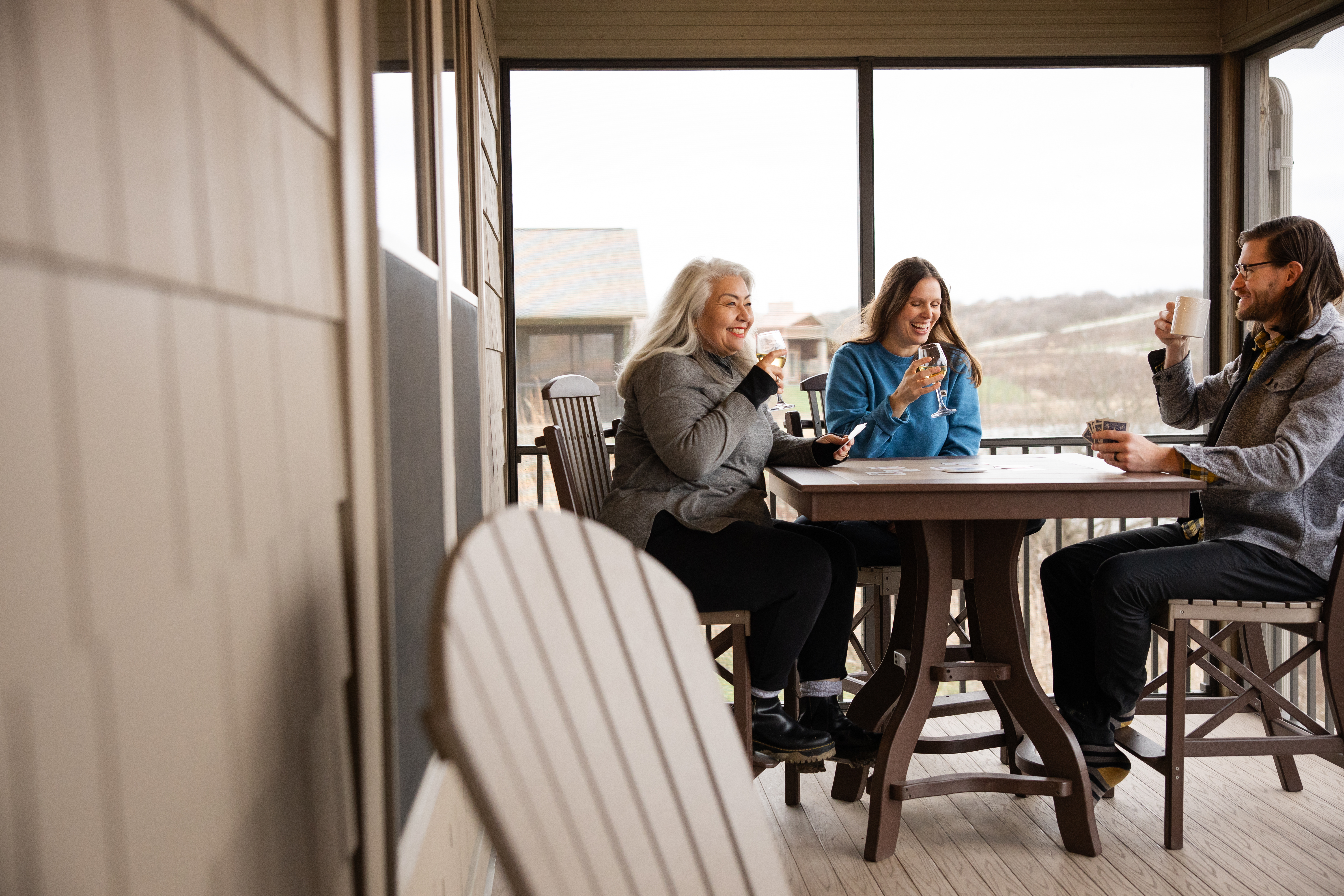 women chatting on cabin deck