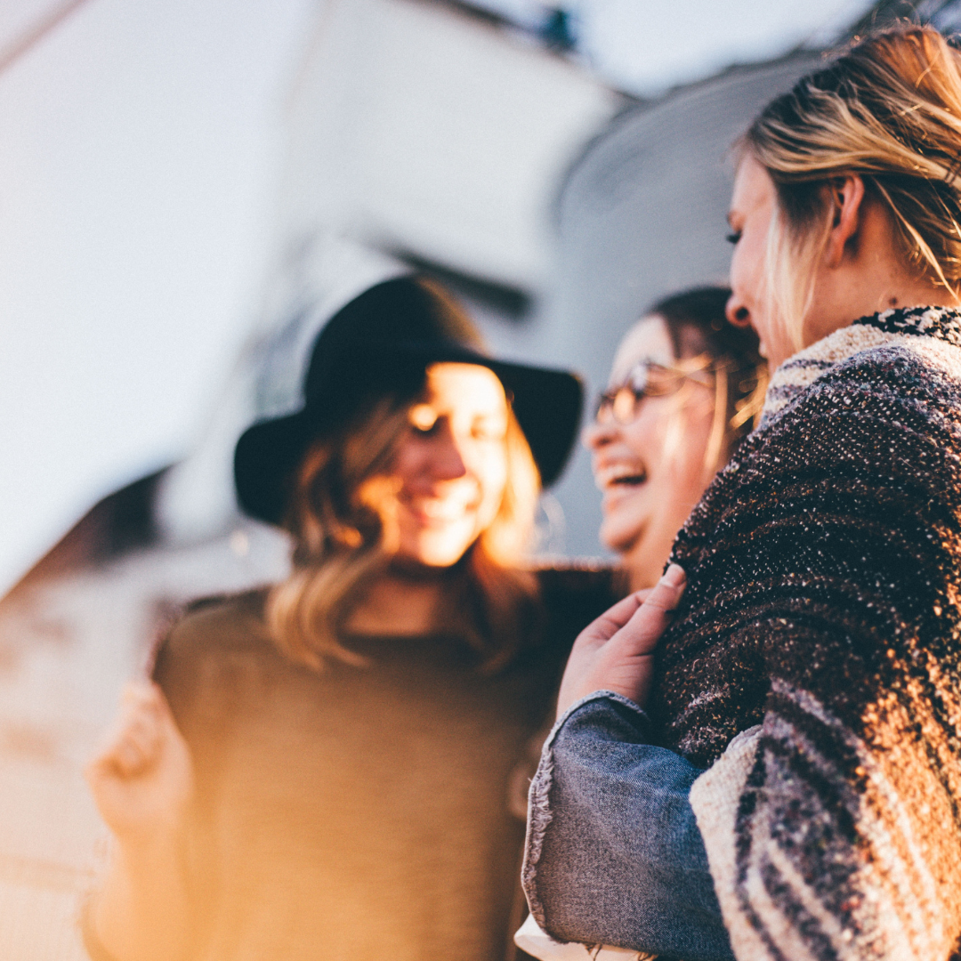 Women laughing and talking