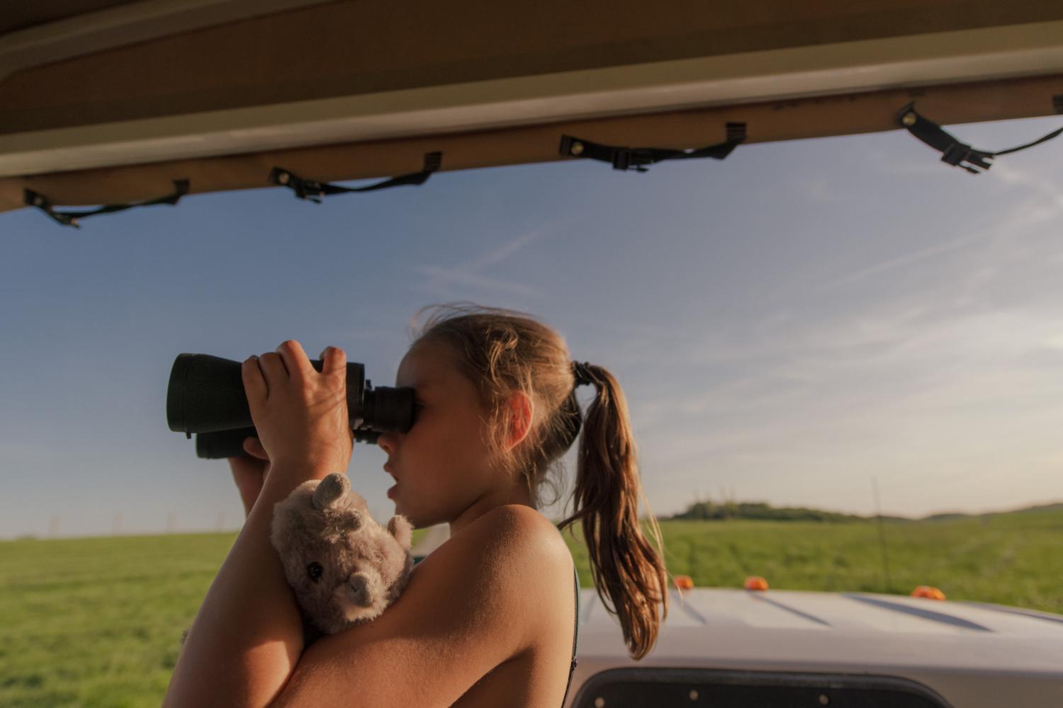 girl with binoculars