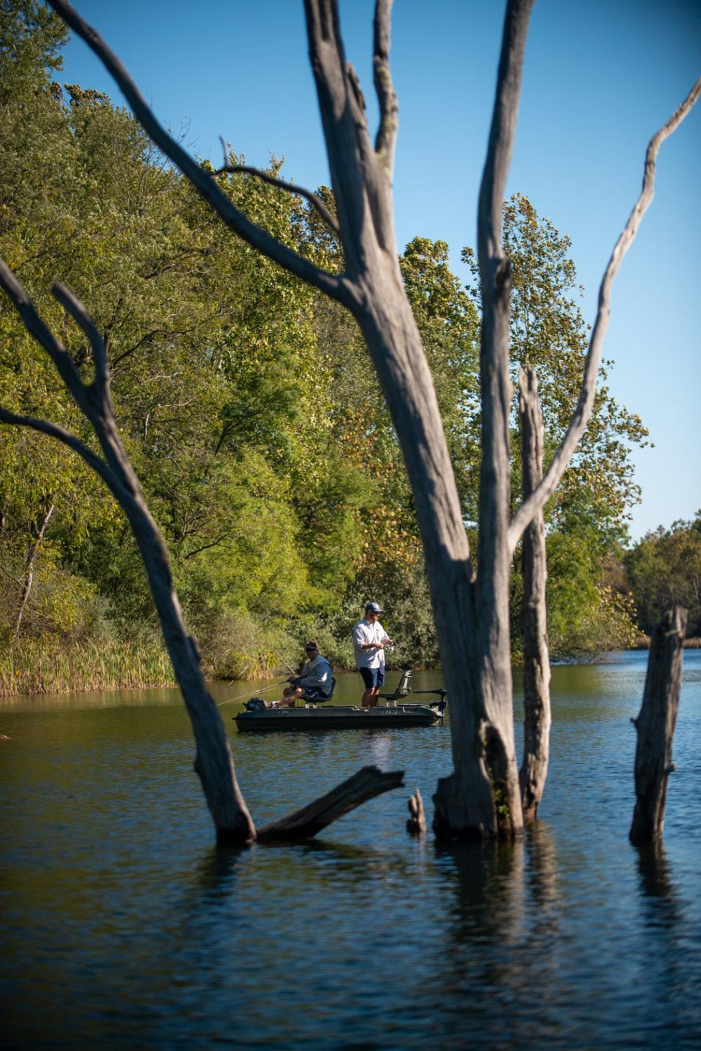 men on boat fishing