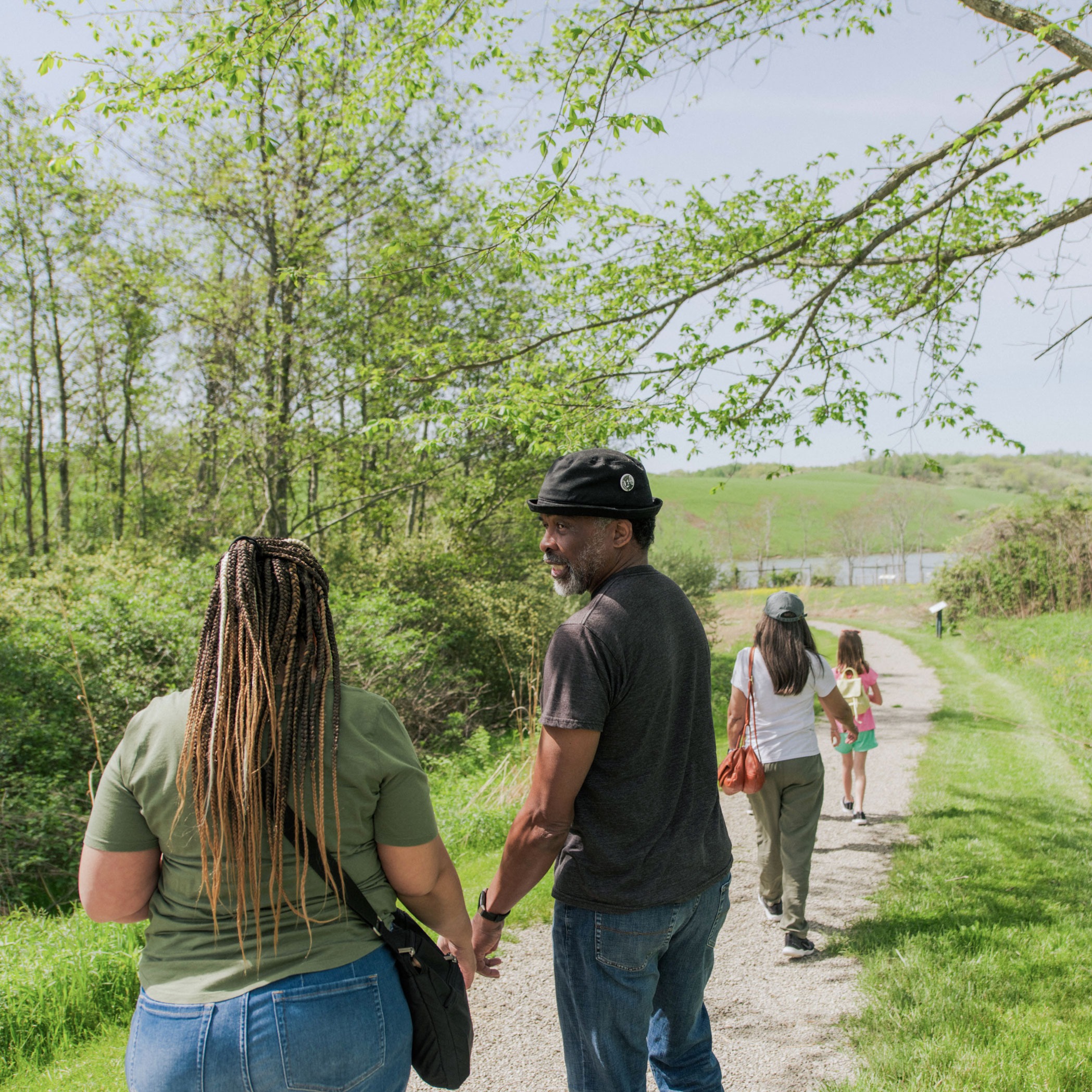 guests hiking down path at The Wilds