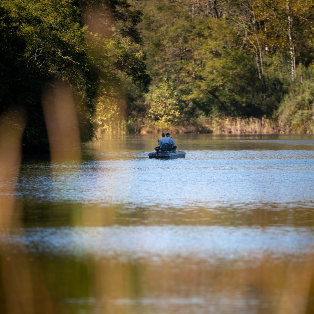 men fishing in boat