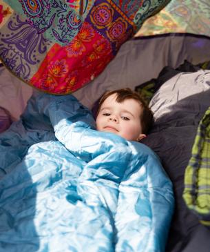 child in tent
