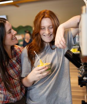 woman holding sweet treat