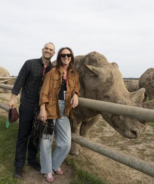 Guests posing with rhino at The Wilds
