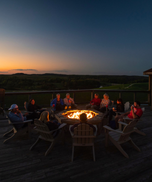 guests around campfire